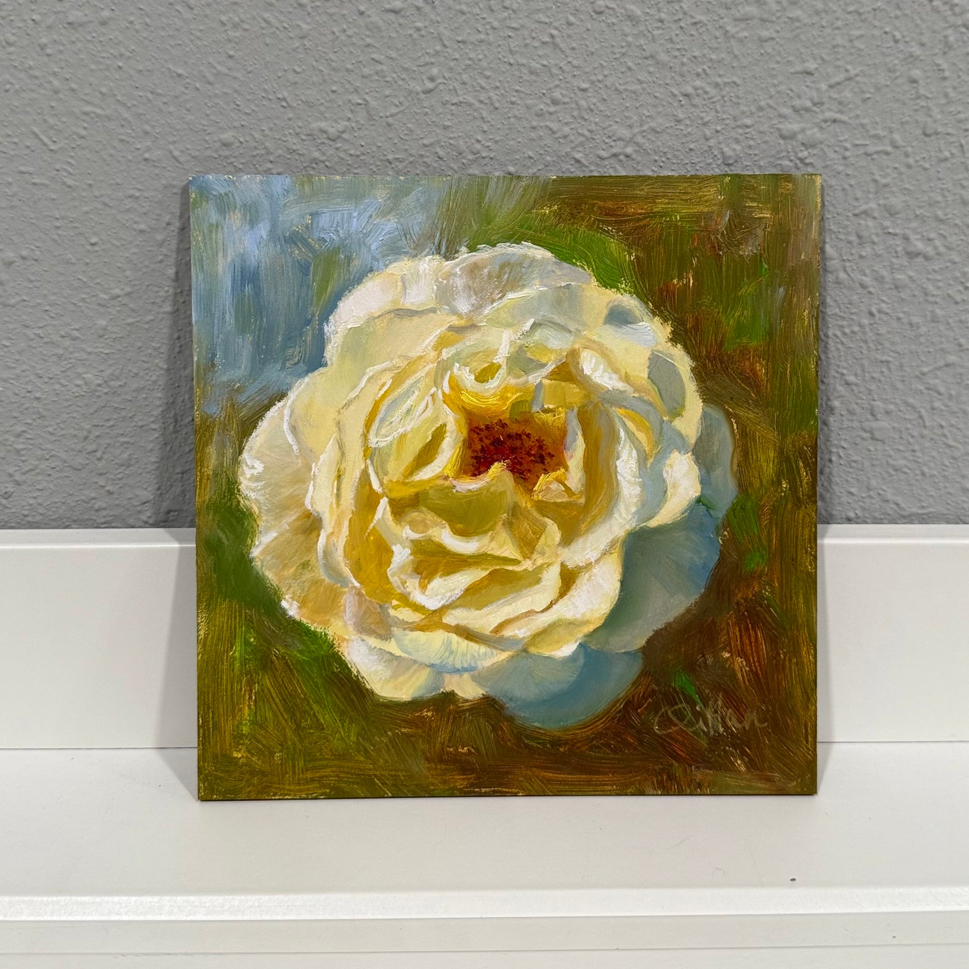 Oil painting of a white rose on a textured wall background